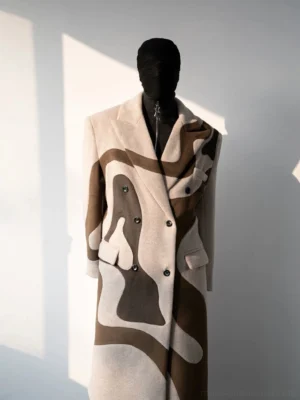 Beige abstract desert camo double-breasted long overcoat front view with camel and brown panels