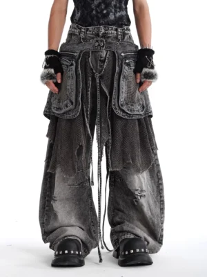 Men's charcoal ash layered cargo jeans front full-body view featuring oversized front cargo pockets, hanging drawstrings, distressed wash, and baggy wide-leg fit