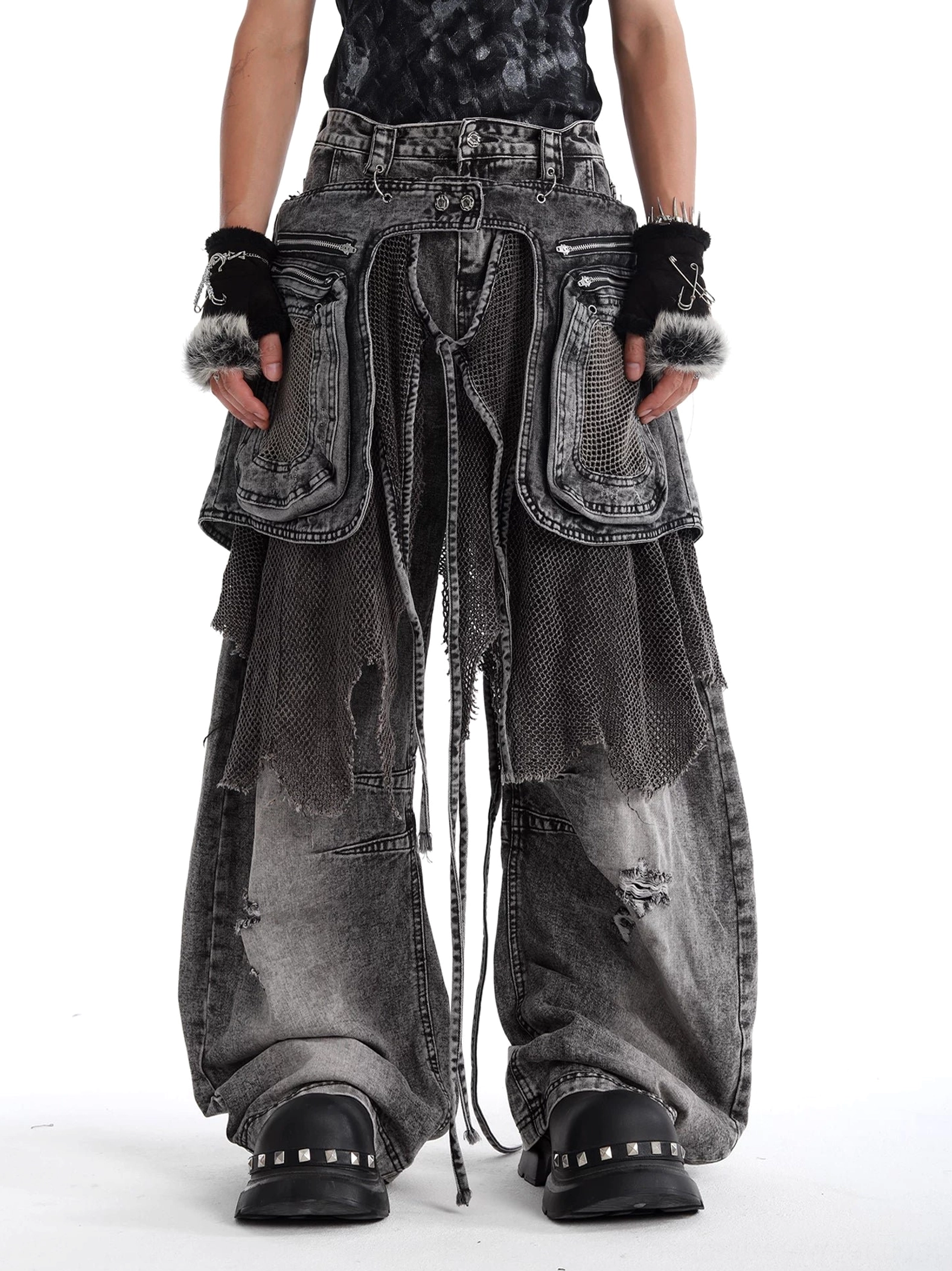 Men's charcoal ash layered cargo jeans front full-body view featuring oversized front cargo pockets, hanging drawstrings, distressed wash, and baggy wide-leg fit