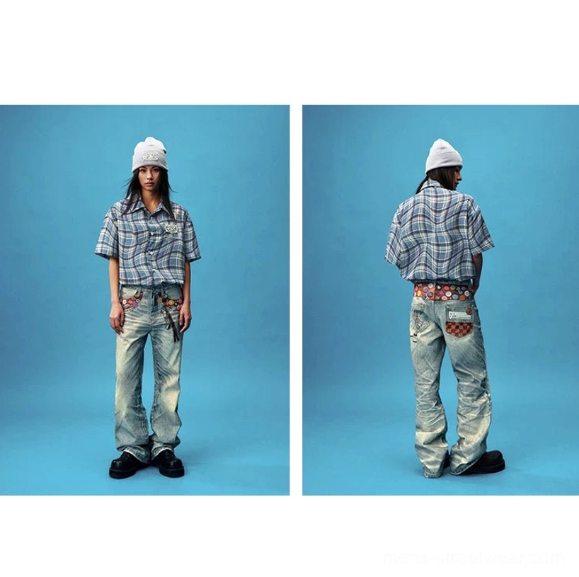 Front and back styling view of unisex acid wash badge embellished wide leg jeans in casual Korean streetwear look