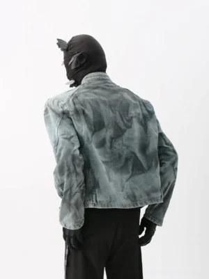 Acid-wash textured denim moto jacket rear view showing structured shoulders and back seam details