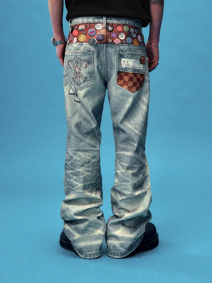 Back full body view of light blue acid wash wide leg streetwear jeans with embroidered rear pocket detail