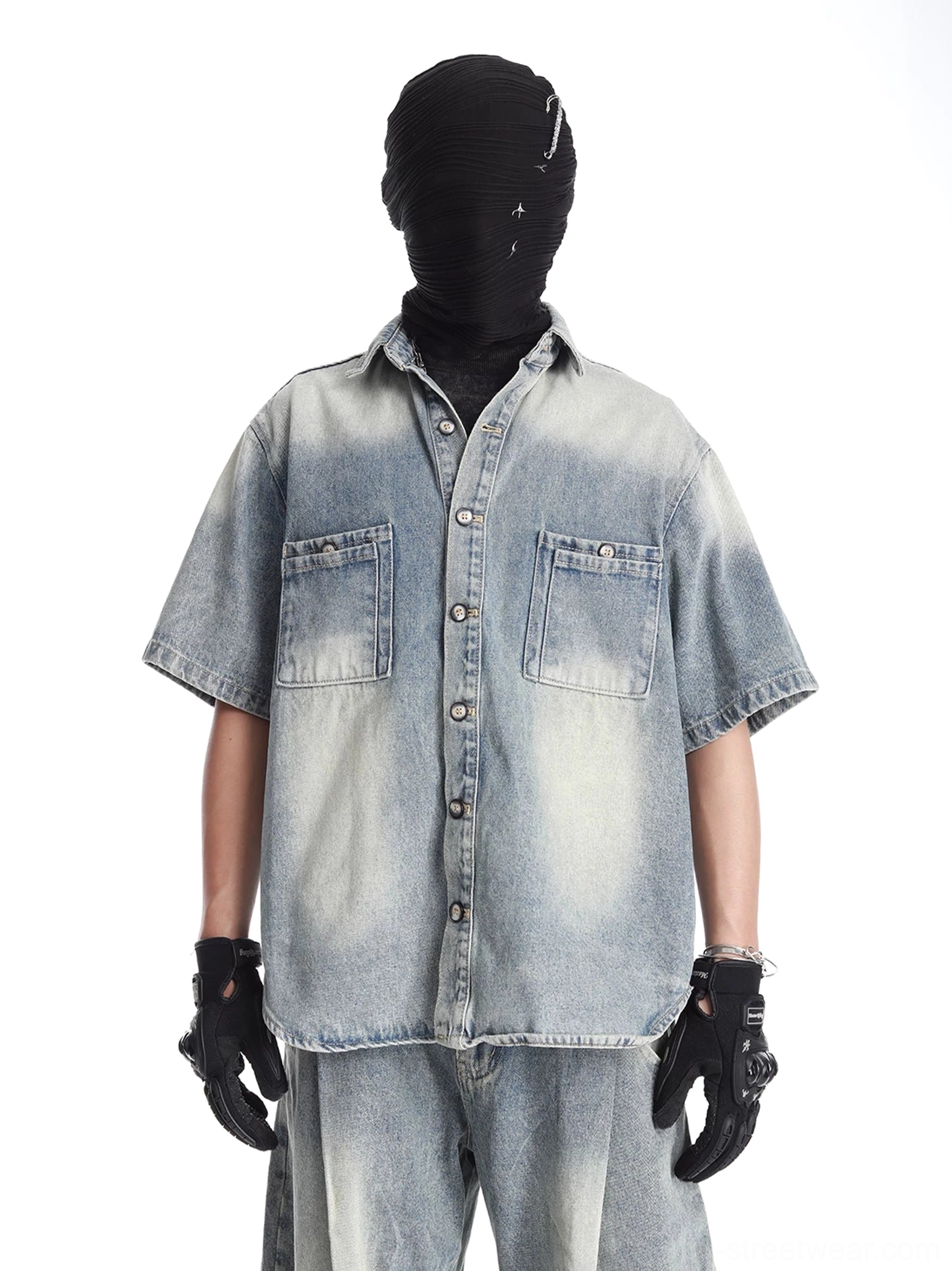 Front close-up of acid-washed vintage blue denim camp shirt with short sleeves, dual chest pockets, button front, point collar, and relaxed Korean streetwear fit