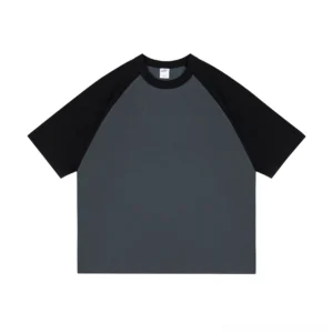 Front flat lay of dark gray and black raglan colorblock tech tee with relaxed boxy Korean streetwear fit