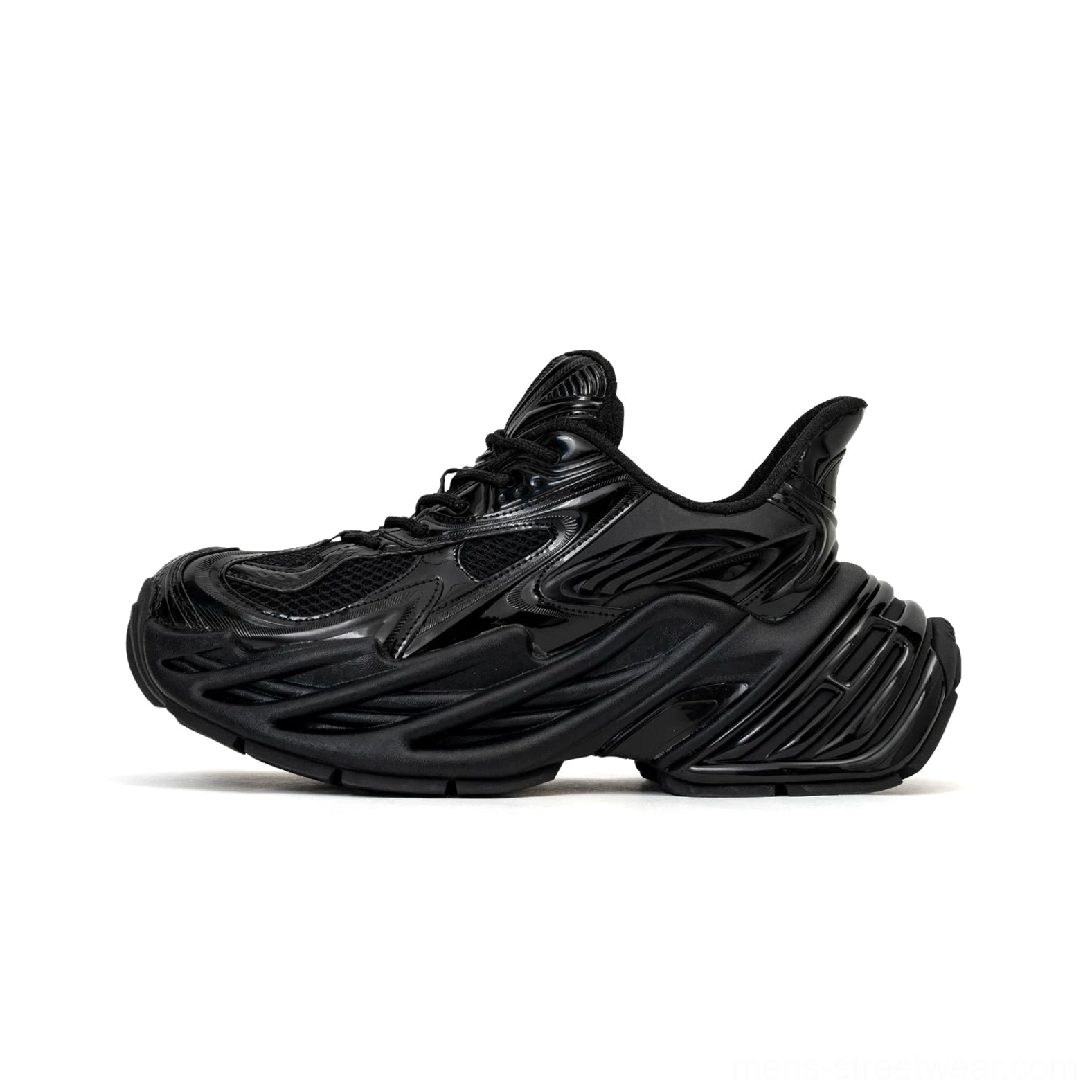 Side profile of all-black futuristic chunky platform sneakers with full glossy ridged construction, layered rounded toe, deep sculpted outsole, and dramatic elevated heel detail