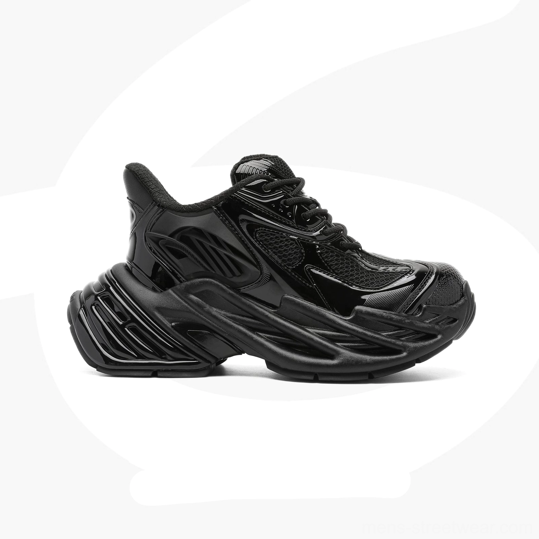 All-black futuristic platform runner sneakers with matte synthetic upper and oversized chunky traction outsole
