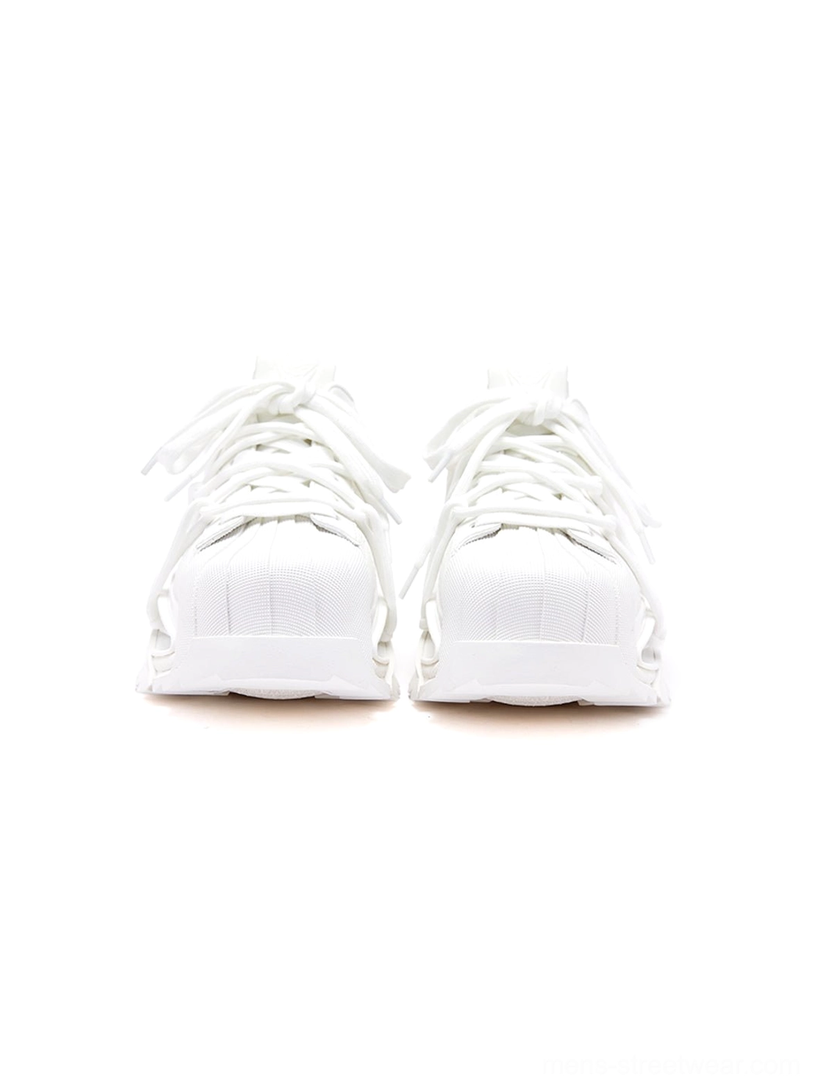 Front view of all-white futuristic runner sneakers featuring a clean toe cap, lace-up closure, and bold chunky silhouette