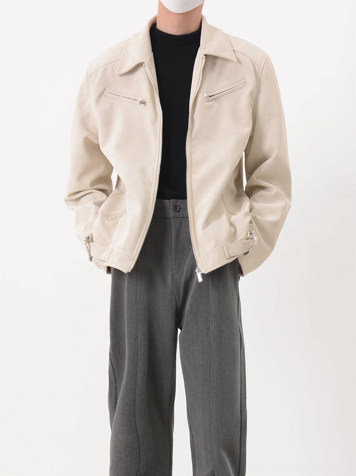 Apricot beige suede-style cropped moto jacket with silver chest and side zippers styled for contemporary streetwear