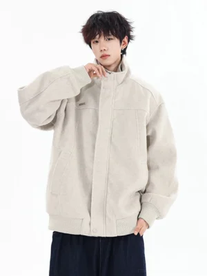 Apricot brushed wool-look bomber jacket with stand collar and clean zipper front shown against a white studio background