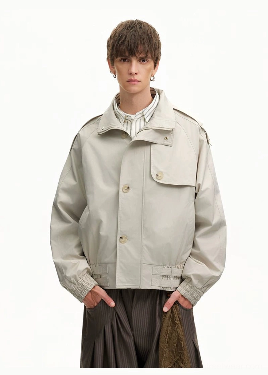 Apricot cropped utility windbreaker jacket with button front closure relaxed fit and wide-leg trouser styling