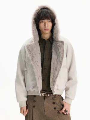Apricot off white faux fur cropped hooded jacket styled with checkered shirt and brown tailored trousers