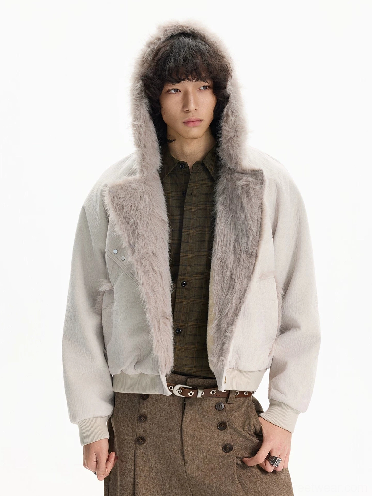 Apricot off white faux fur cropped hooded jacket styled with checkered shirt and brown tailored trousers
