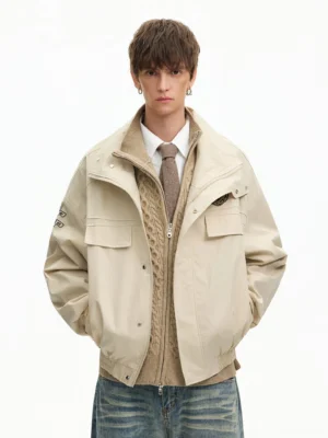 Apricot Korean streetwear high collar bomber jacket styled with cardigan shirt tie and blue jeans