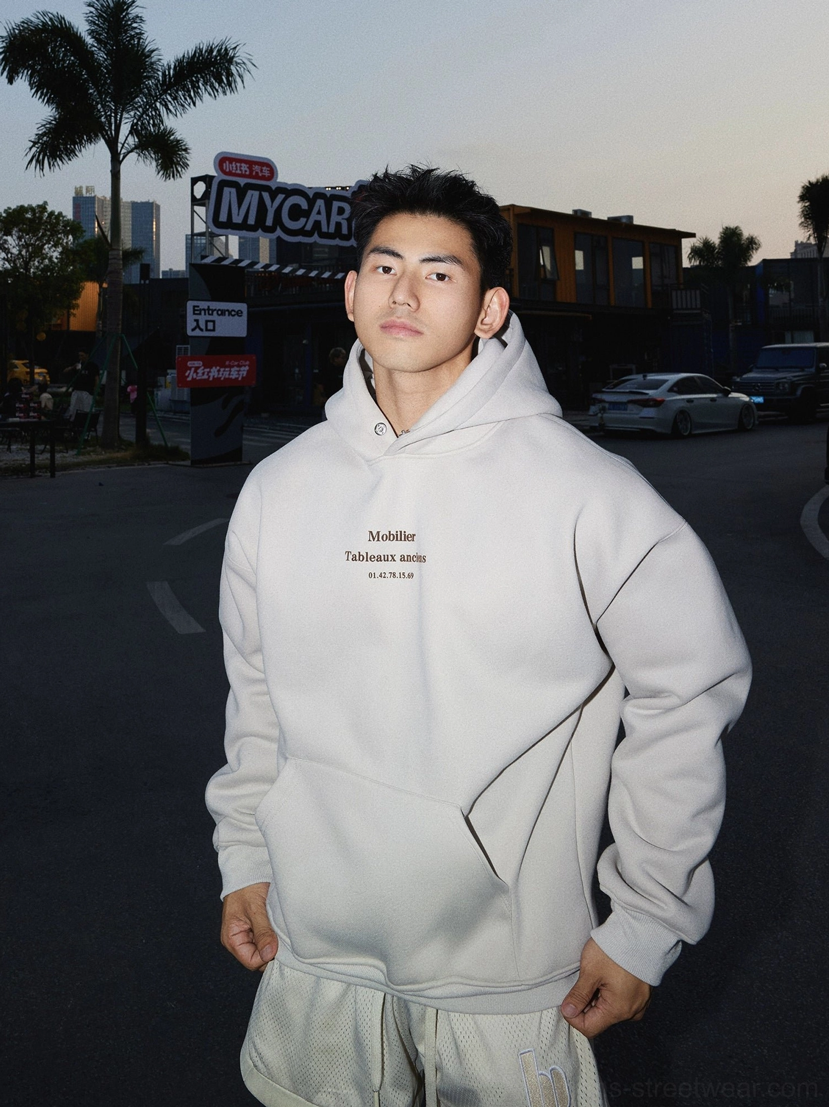 Apricot minimal text graphic pullover hoodie with relaxed oversized streetwear fit and kangaroo pocket