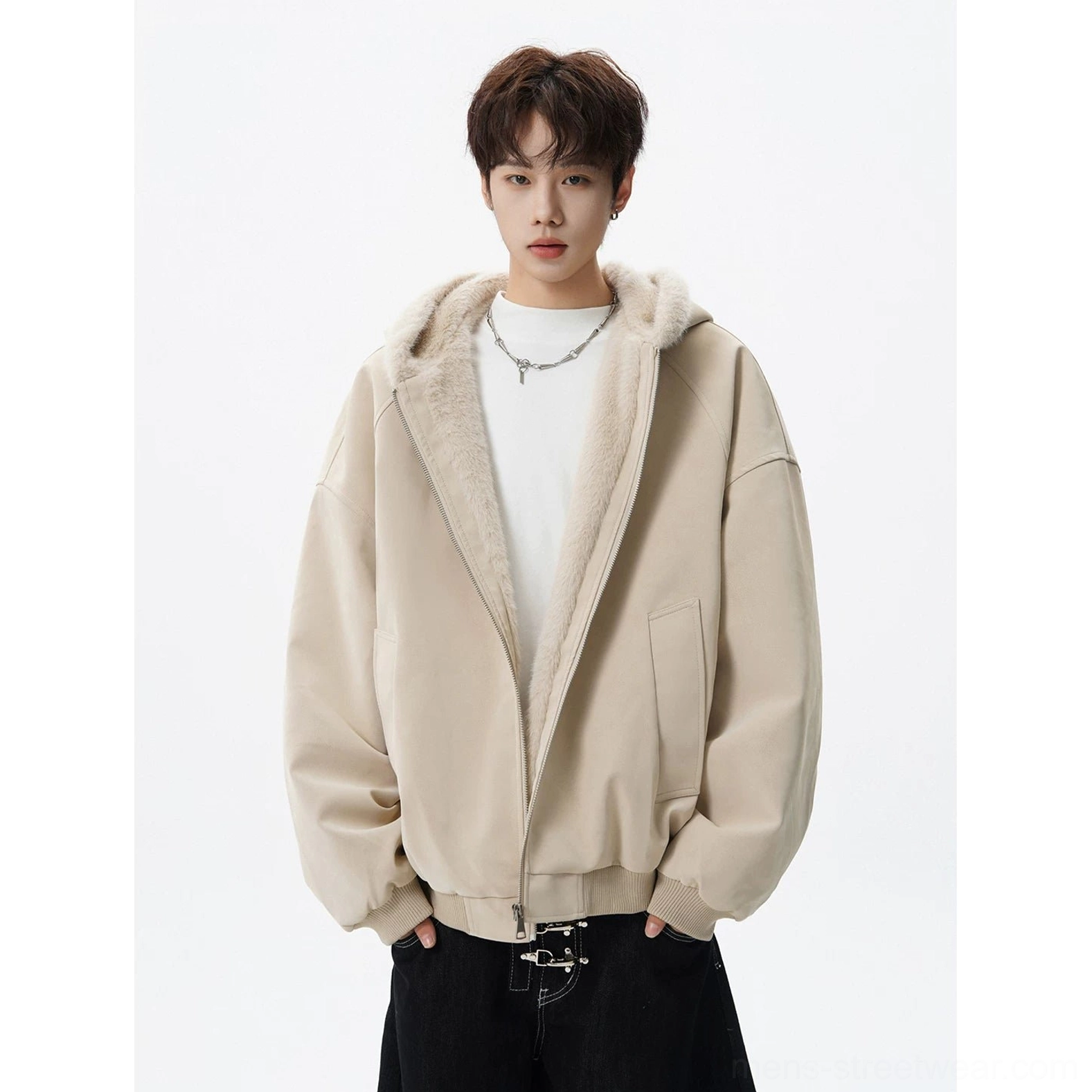 Apricot plush lined hooded bomber jacket worn open with dropped shoulders, ribbed hem, and minimalist solid-color streetwear design
