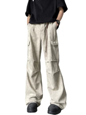 Front view of apricot stone-wash wide-leg cargo pants with drawstring waist oversized flap pockets and relaxed Korean streetwear fit
