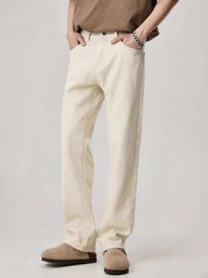 Apricot straight leg denim jeans front view showing relaxed fit, functional pockets, and casual streetwear styling