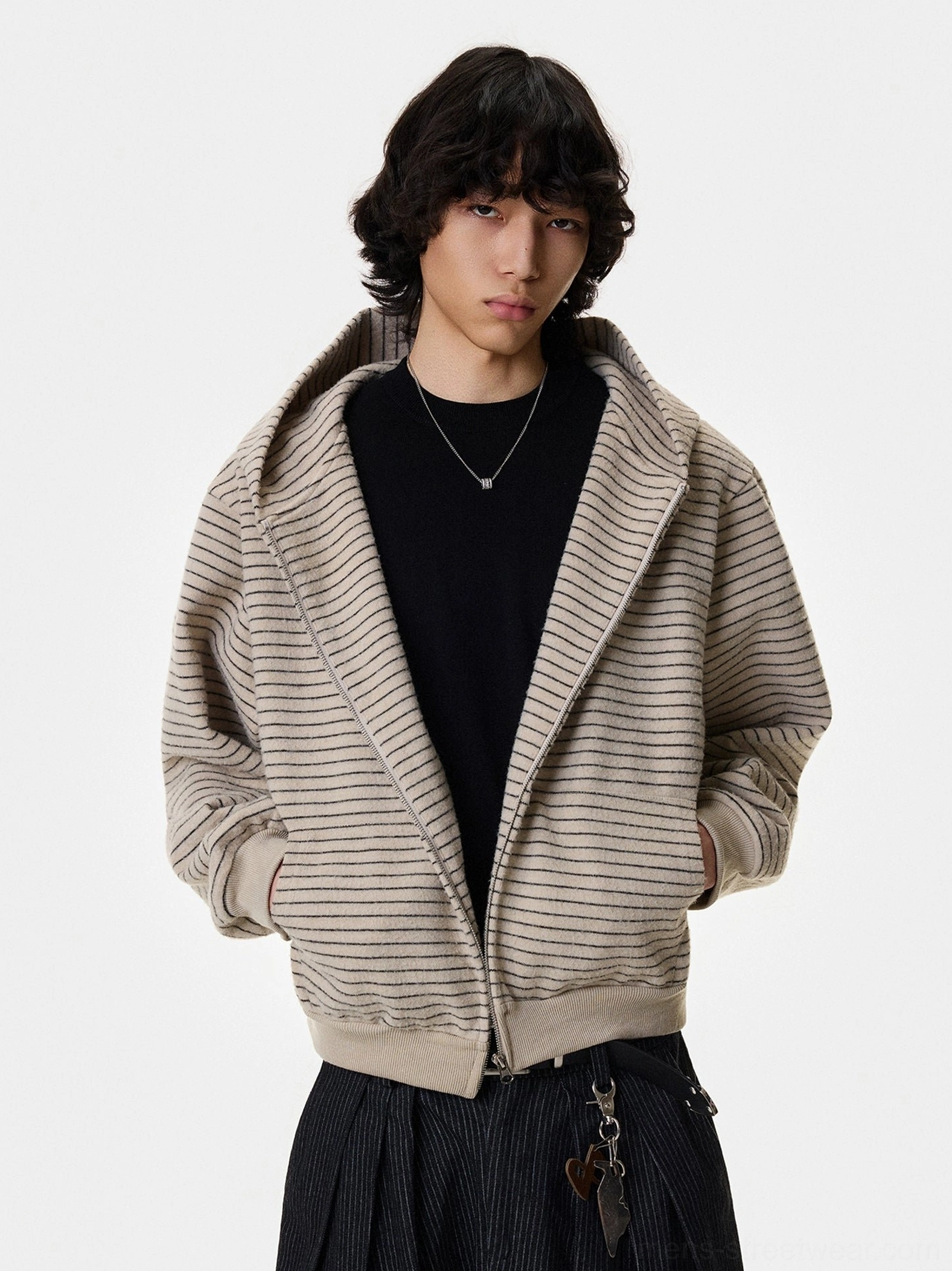 Apricot striped oversized zip hoodie with silver fox fur trimmed hood and front pockets on male model