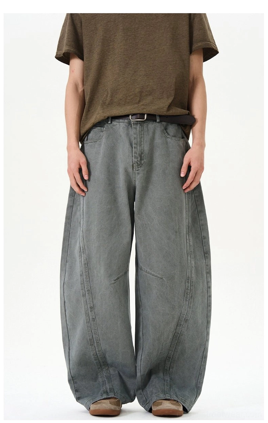 Bluish gray green arc seam ultra-wide washed denim balloon jeans front view with relaxed Seoul streetwear styling