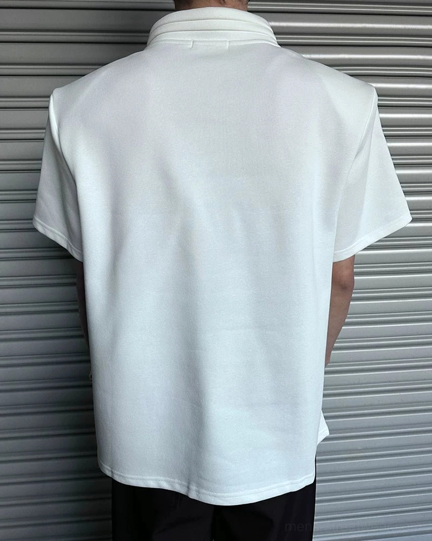 Architectural short sleeve T-shirt with asymmetric mock neck collar, clean solid fabric, and contemporary Seoul street style