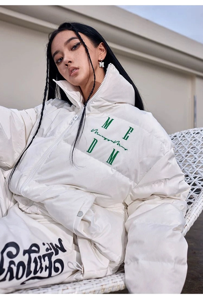 White oversized duck-down puffer jacket with high stand collar relaxed fit and quilted winter streetwear design