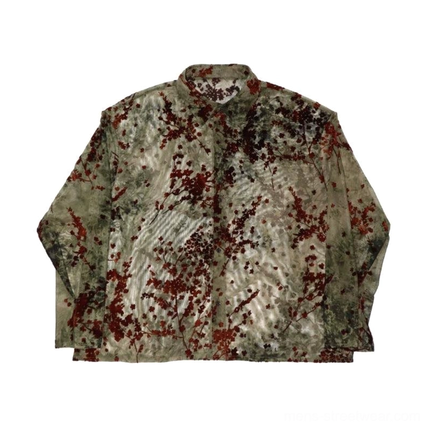 Flat lay of army green semi-sheer floral button-up shirt with dark red botanical print, classic collar, and relaxed fit