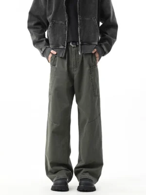 Army green washed cargo pants with relaxed baggy wide-leg fit shown from the front with a cropped jacket and black leather shoes