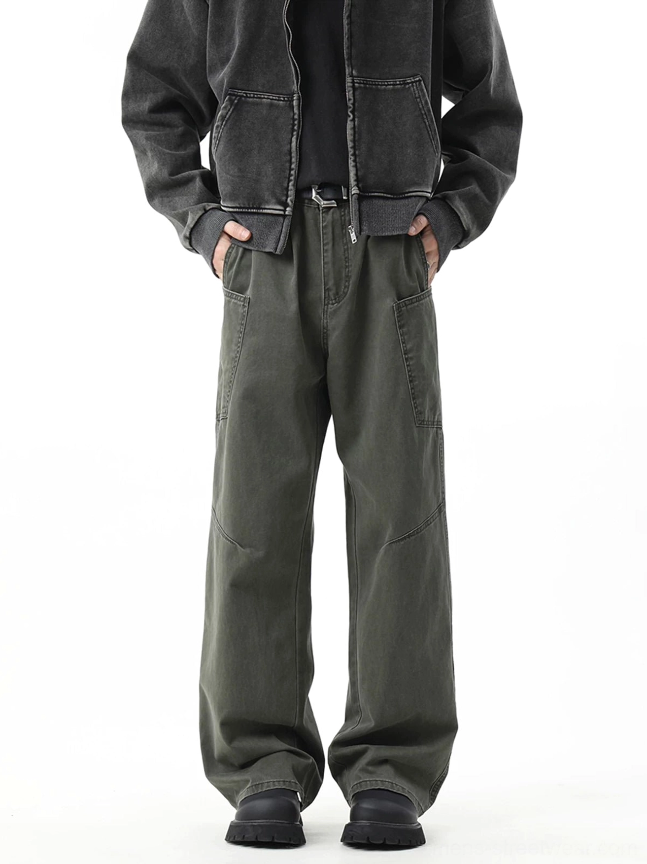 Army green washed cargo pants with relaxed baggy wide-leg fit shown from the front with a cropped jacket and black leather shoes