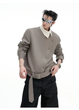 Three-quarter side view of men's ash grey asymmetrical button jacket with loose sleeves and hanging waist belt
