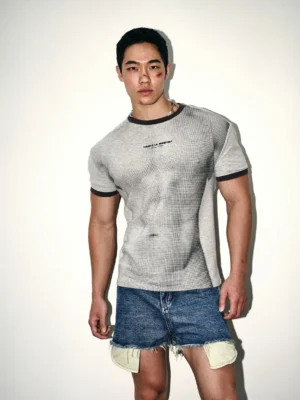 Front view of ash gray waffle mesh ringer T-shirt with dark contrast neckline sleeve cuffs and PAPA'S LIL MONSTER chest print
