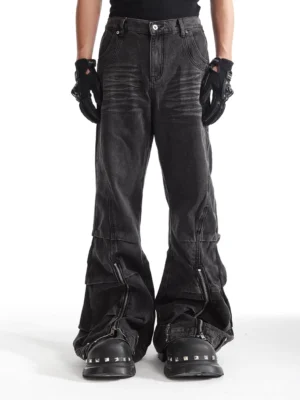 Front view of ash washed deconstructed zip flare streetwear denim jeans with faded black grey finish and wide leg silhouette