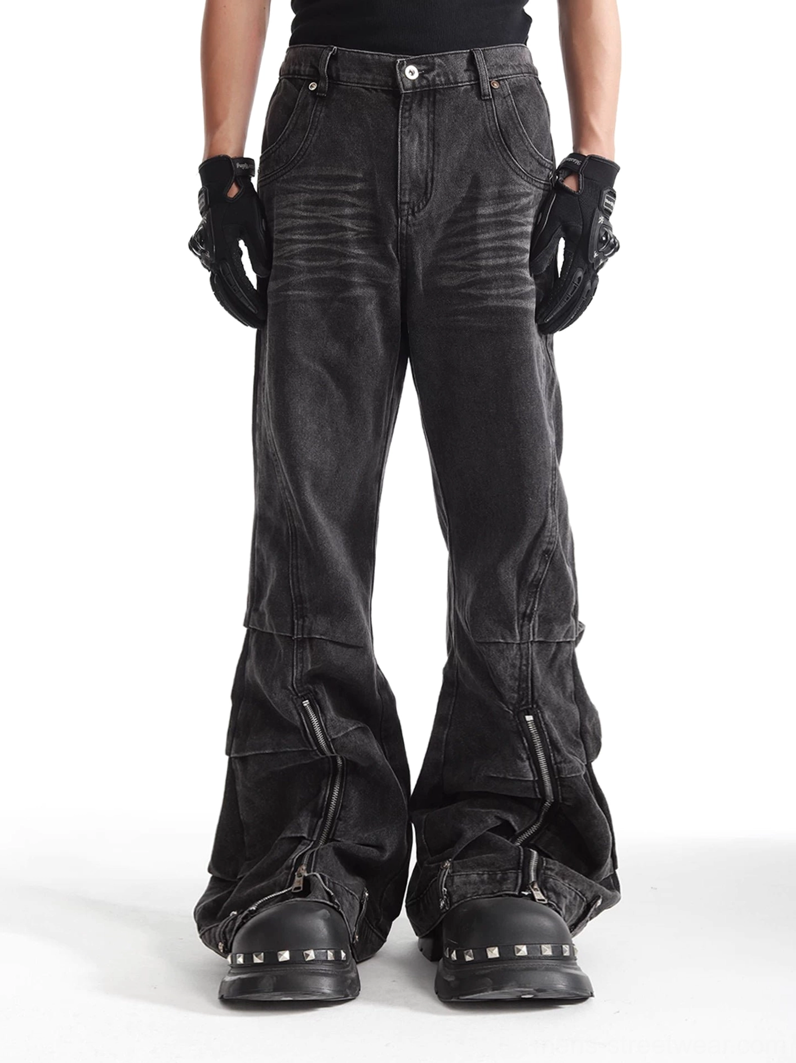 Front view of ash washed deconstructed zip flare streetwear denim jeans with faded black grey finish and wide leg silhouette