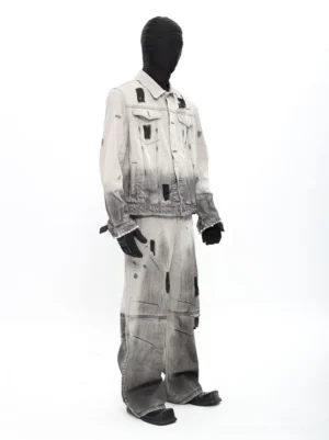 Ashfall gradient distressed denim jacket and wide-leg jeans set in beige to charcoal grey ombre wash left three-quarter view