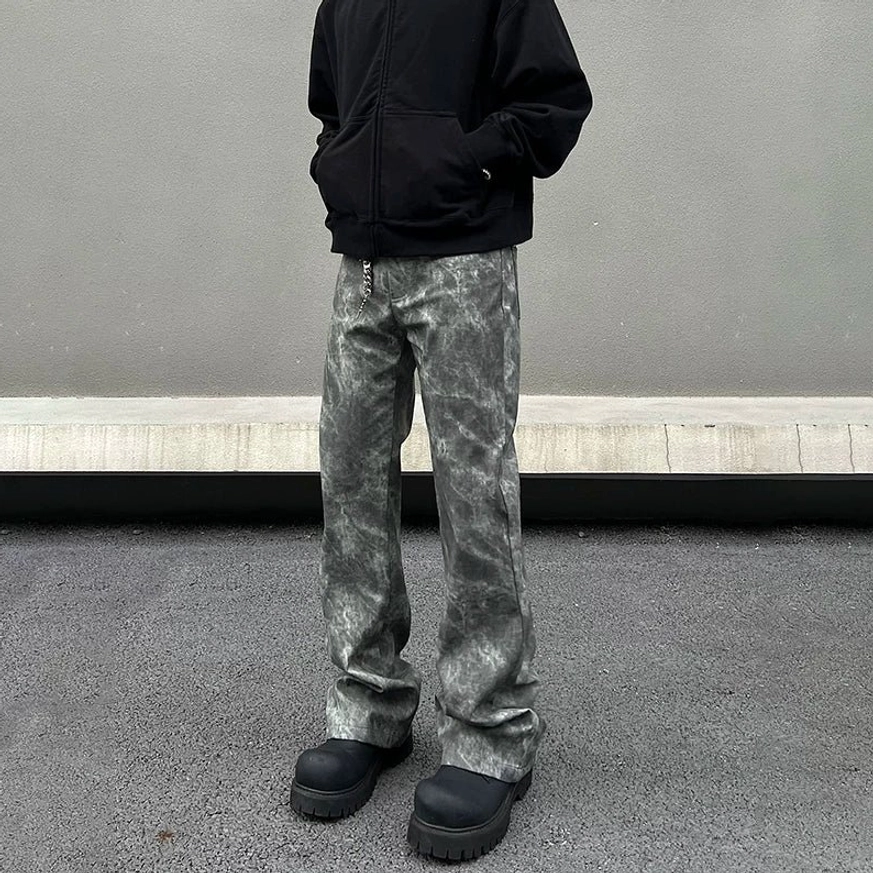 Front view of Ashstorm grey tie-dye marble wash flared jeans showing waistband five-pocket construction and relaxed fit