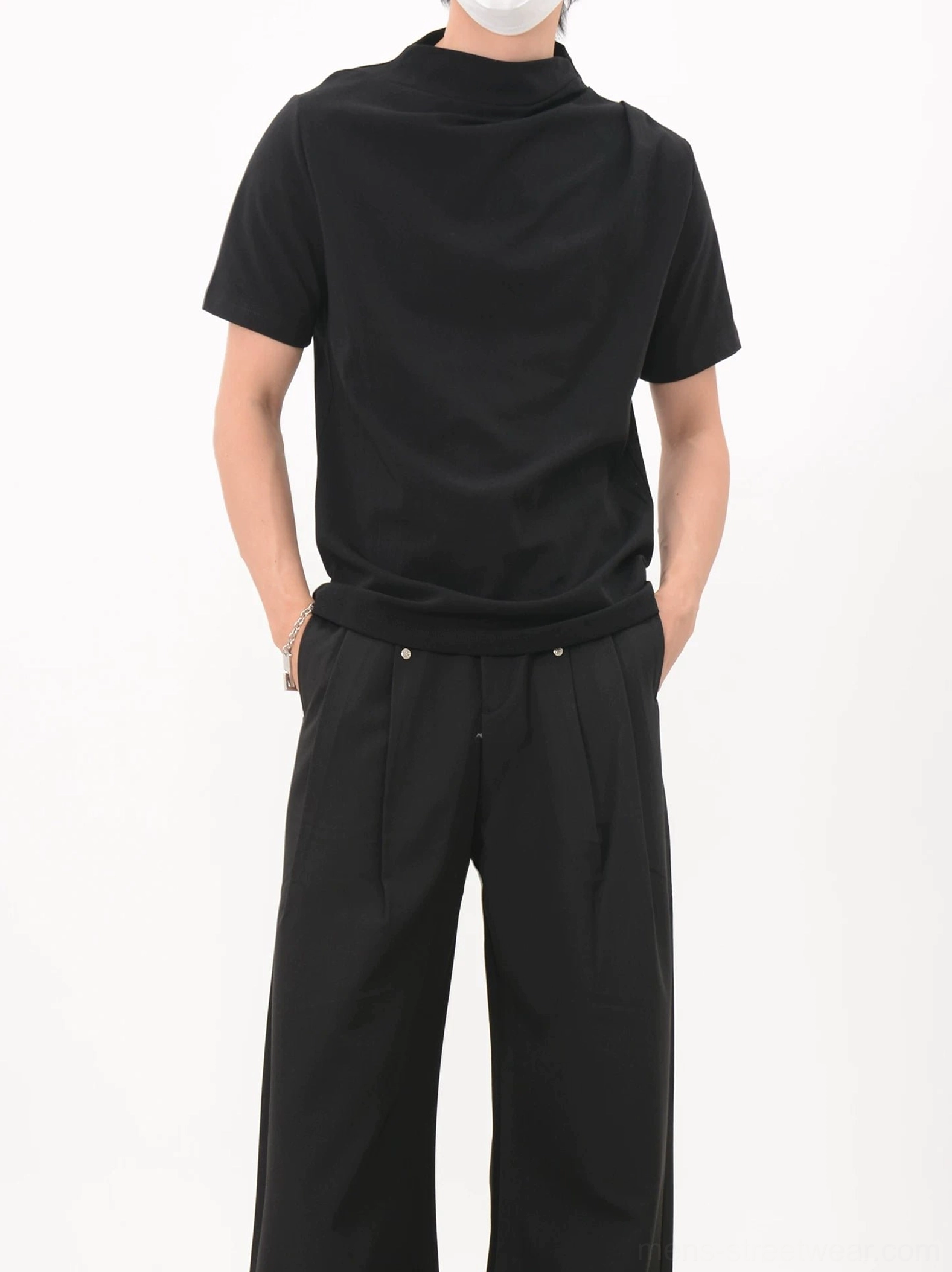 Black fitted drape collar jersey tee front view showing clean short sleeve minimalist silhouette