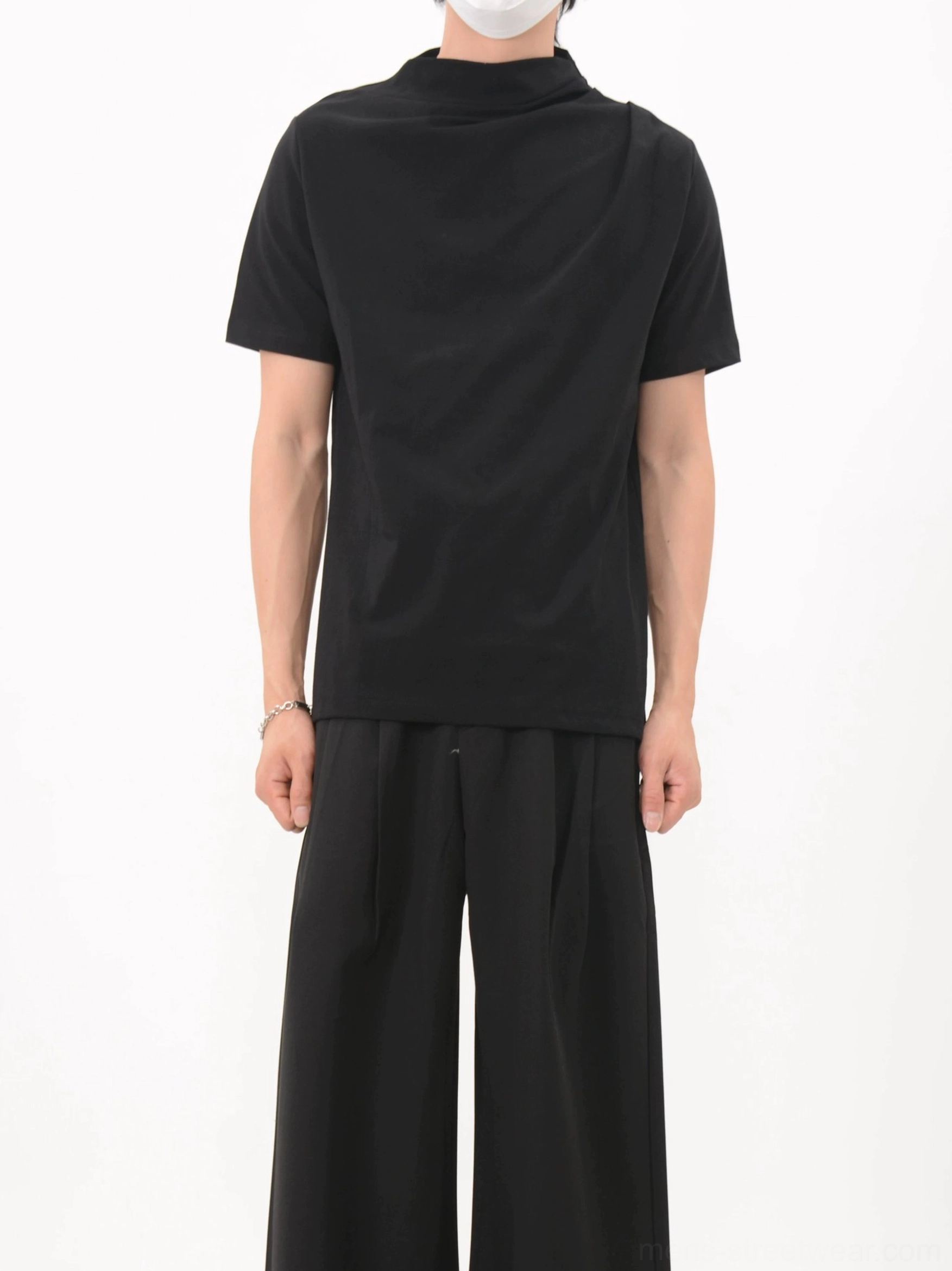 Black asymmetric drape collar jersey tee rear view with clean back seam and short sleeves