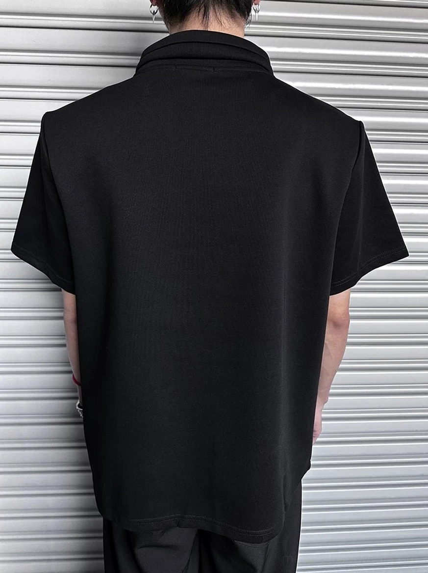 Asymmetric mock neck T-shirt in minimalist black and white streetwear style with architectural collar and relaxed citywear proportions