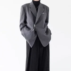Heather gray asymmetric zip oversized blazer styled with black turtleneck and wide leg trousers in a Seoul streetwear studio look