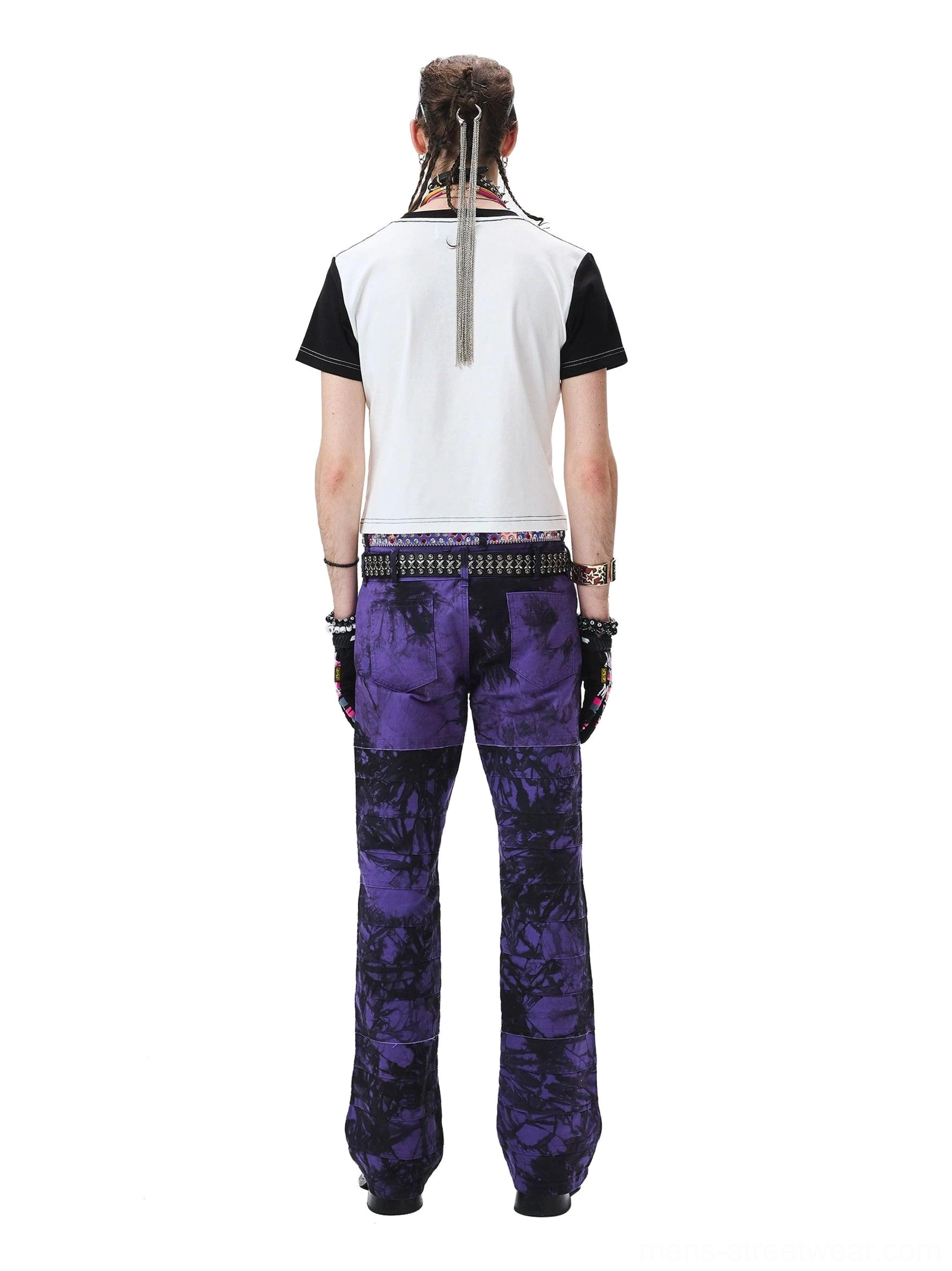 Avant-garde purple tie-dye trousers with distressed details and wide-leg streetwear styling