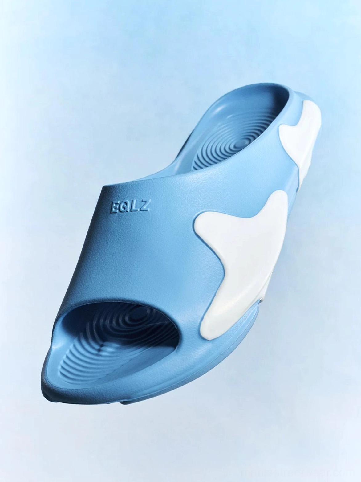 Baby blue cloud-cushion open-toe slides with white contrast panel and embossed upper detail