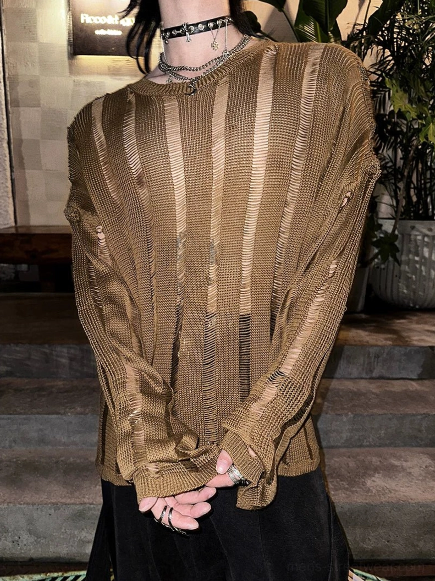 Back three-quarter view showing the oversized distressed knit sweater with long sleeves and continuous vertical stripe texture across the back