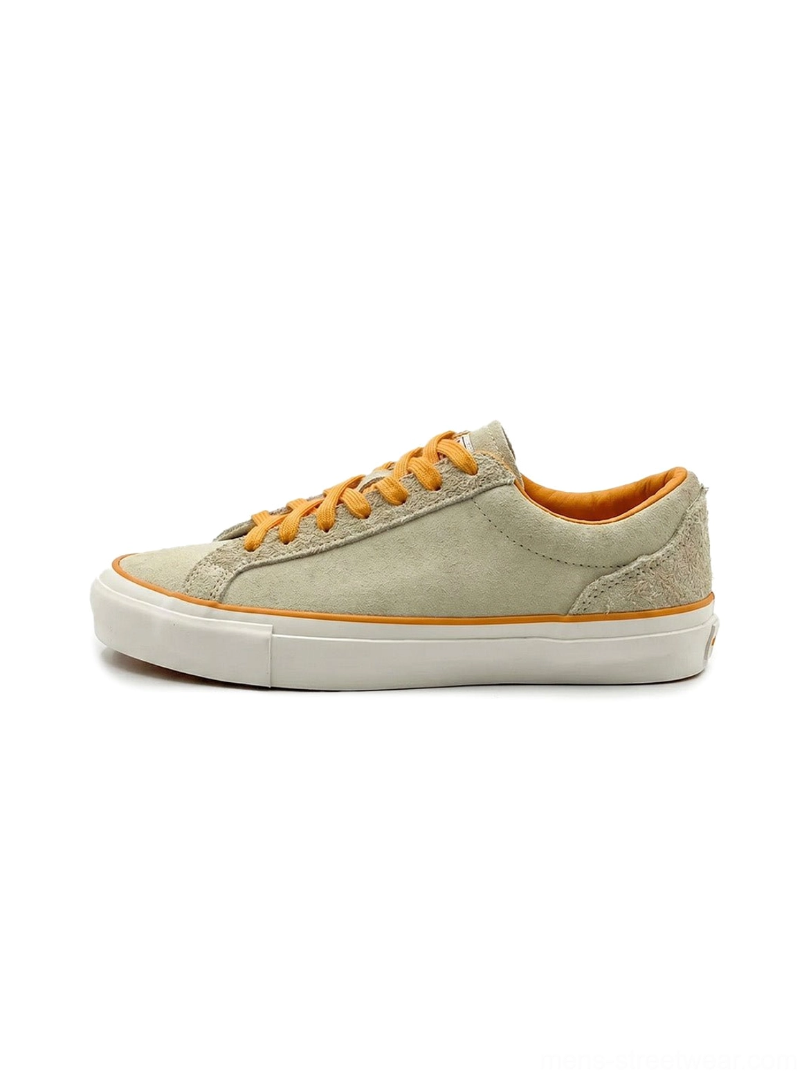Single beige colorblock suede skate shoe with bright orange laces, orange piping trim, white rubber outsole, and low-top streetwear silhouette