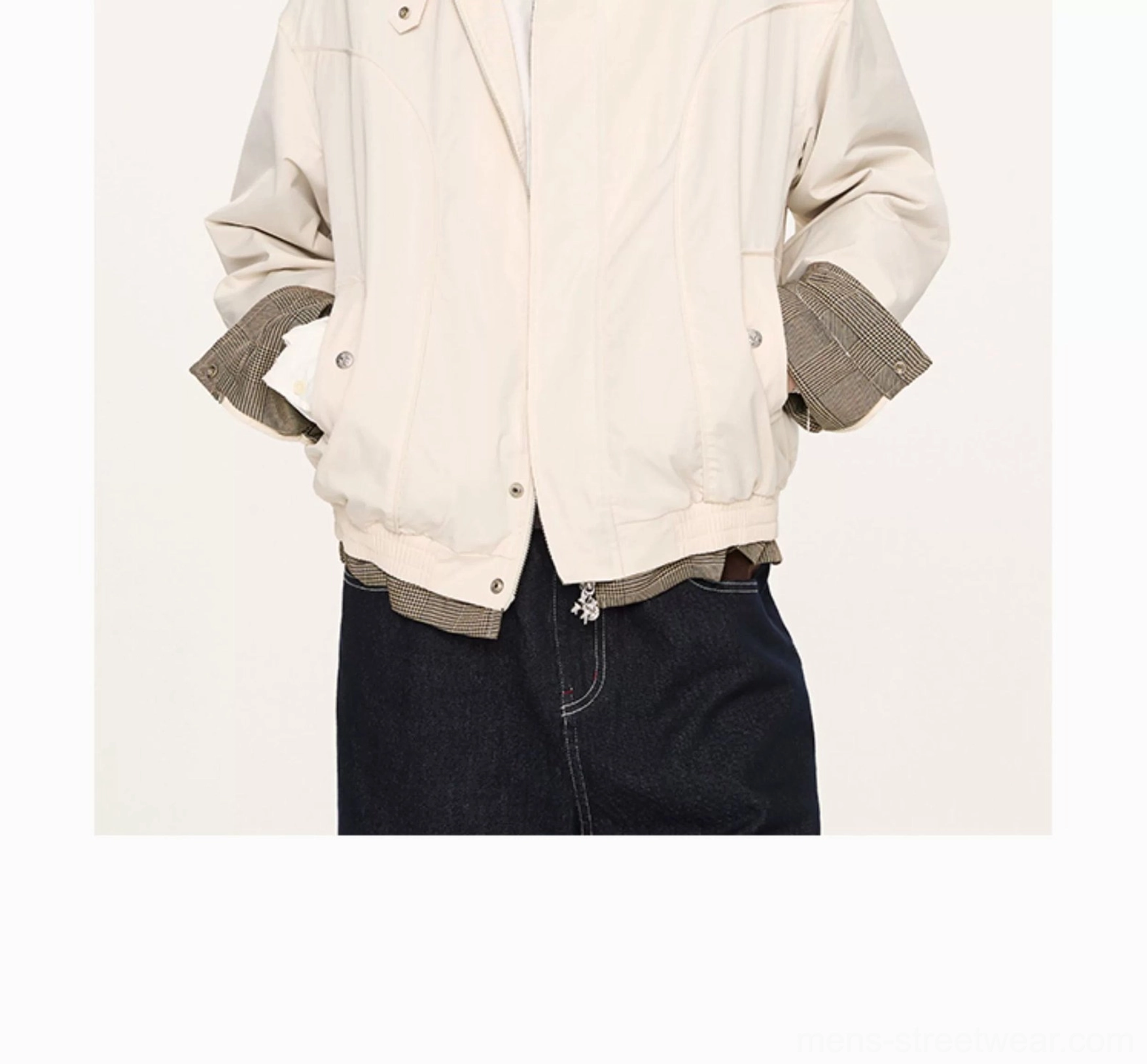 Beige cropped Harrington jacket rear three-quarter view showing clean back silhouette contrast grey cuff lining and hem detailing
