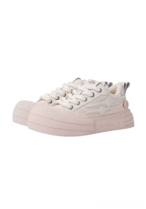 Single beige smile graphic platform sneaker shown in side profile with layered panels, lace-up front, chunky rubber sole, and star-shaped side detail