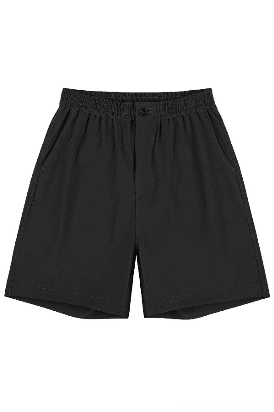 Black 320GSM cotton outdoor tech shorts with elastic waist button closure side pockets and rolled hem detail