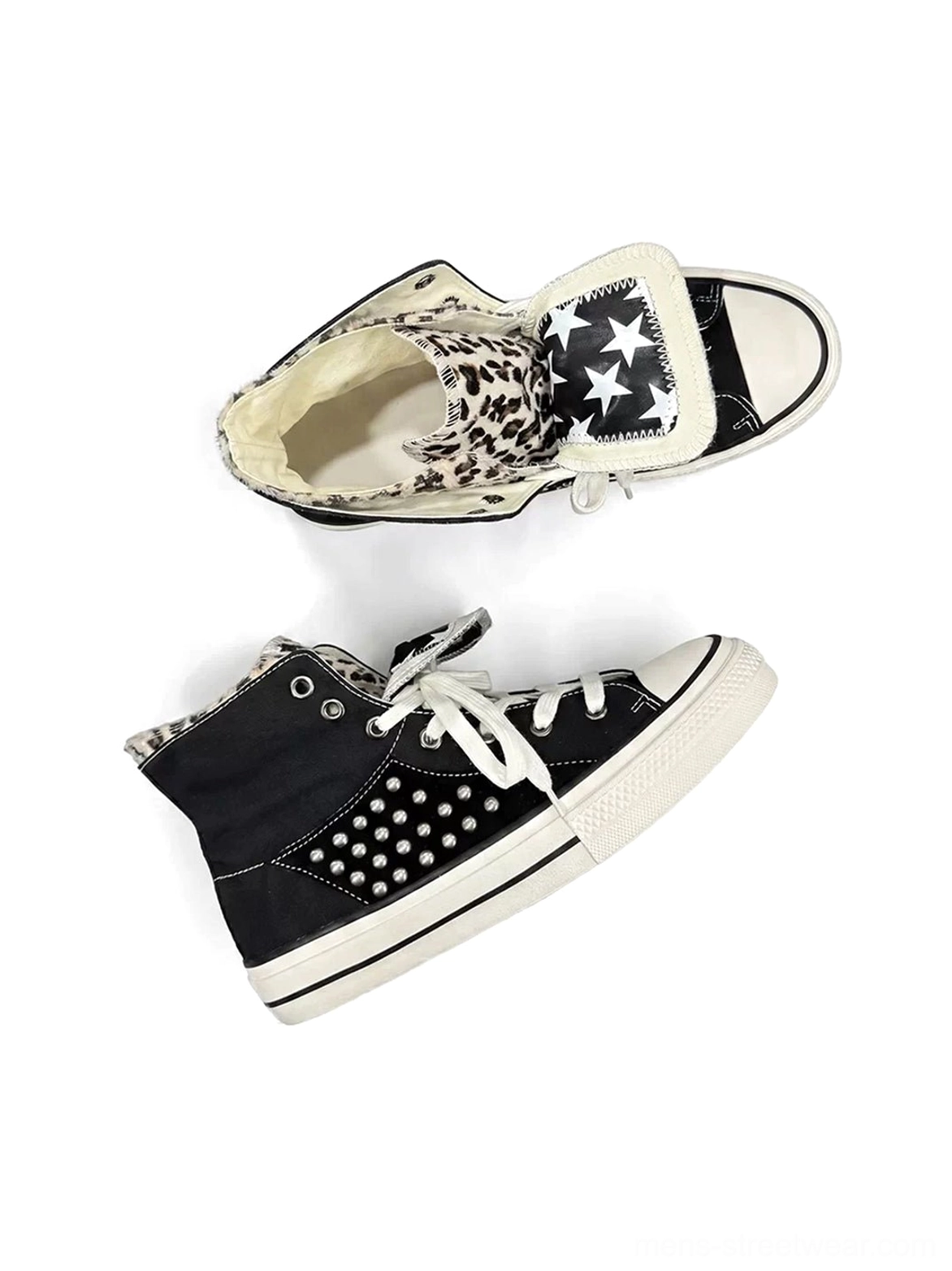 Top and side view of black high-top canvas sneakers with animal-print inner tongue, star printed cover, metallic rivets, and white rubber sole