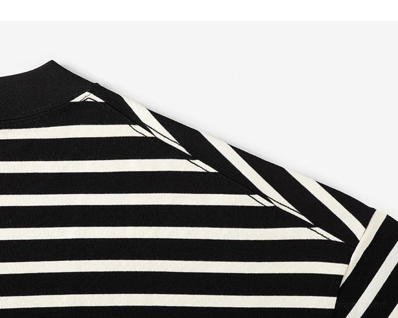 Close-up of the shoulder and upper back construction with matching stripes on a black apricot Breton tee