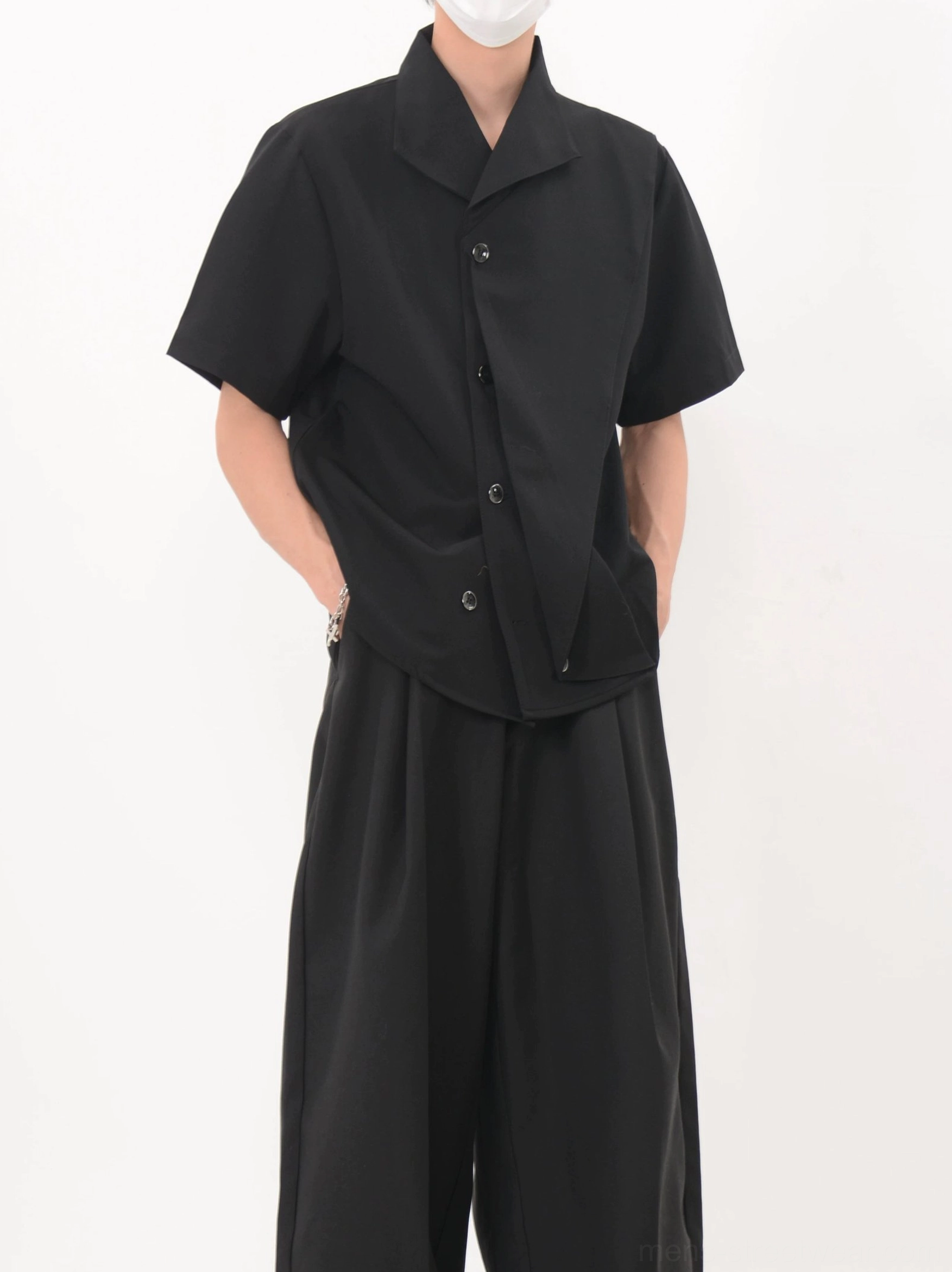 Black asymmetric cascade shirt front full body outfit with wide leg tailored pants