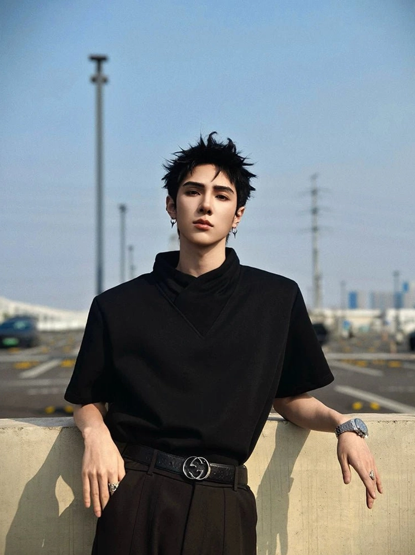 Black asymmetric mock neck T-shirt product image showing origami-inspired collar, relaxed fit, and minimalist techwear streetwear design