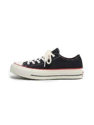 Black bat graphic hidden lift platform canvas streetwear sneaker side view with off-white rubber toe cap and red foxing stripe